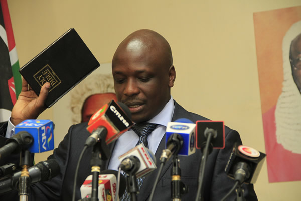 Apollo Mboya taking his oath