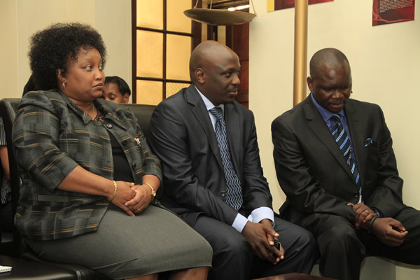 Commissioner Ruth, Mboya and CEO follow the proceedings